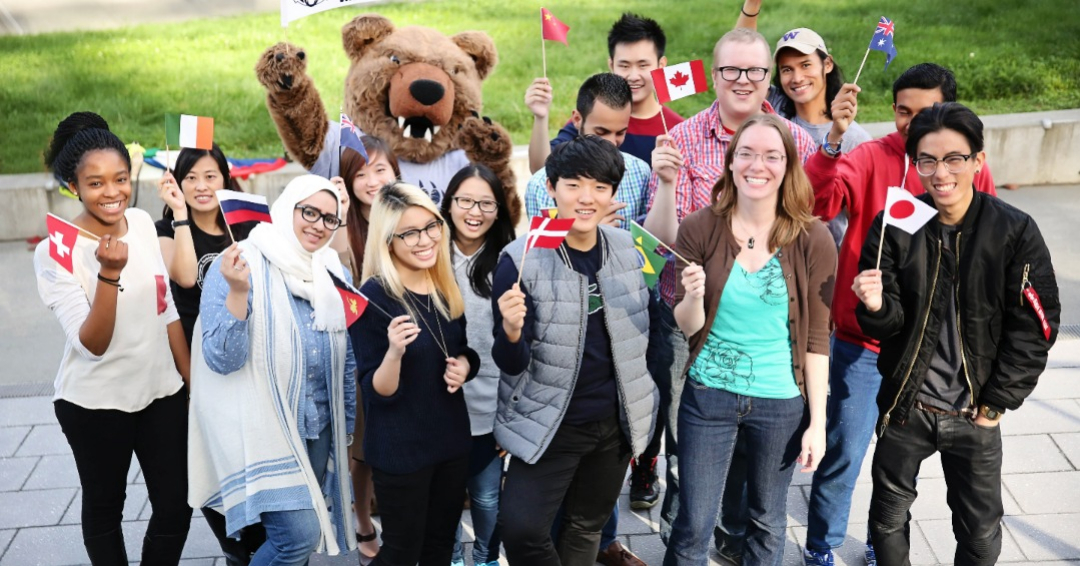 International students at Cascadia College holding their country flags.
